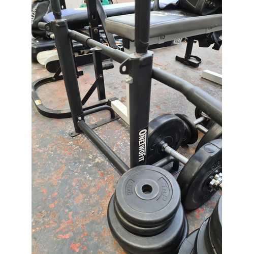 818 - A large collection of weight training equipment to include Hardcastle Body Building flat bench, Marc... 