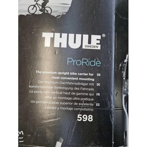 828 - Two boxed Thule ProRide 598 bike carriers and a pair of roof bars