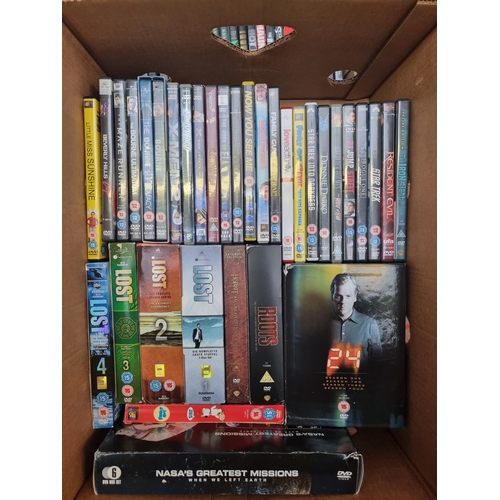 741 - Three boxes containing a collection of CDs, DVDs and VHS tapes