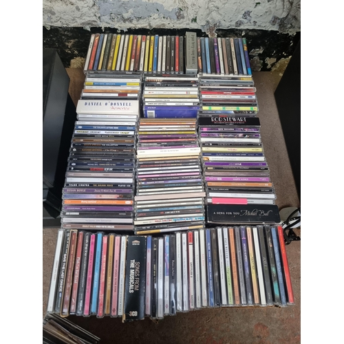 743 - Five boxes containing a collection of CDs