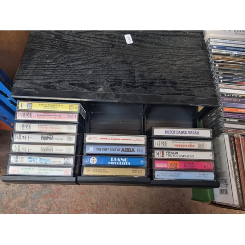 743 - Five boxes containing a collection of CDs