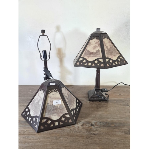 475 - A pair of Decor Art Creations Ltd. bronze effect table lamps with glass shades depicting Leek, Staff... 