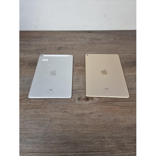 707 - Two Apple iPad Air 2 tablets, one A1566 and one A1567