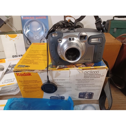 652 - A collection of items to include boxed Kodak D5000 Zoom weather-resistant 2mp digital camera with ac... 