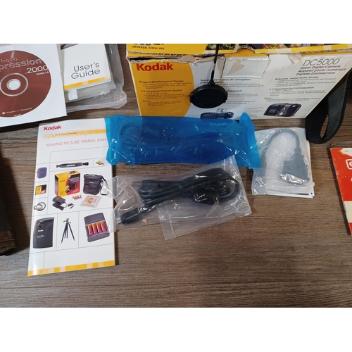 652 - A collection of items to include boxed Kodak D5000 Zoom weather-resistant 2mp digital camera with ac... 