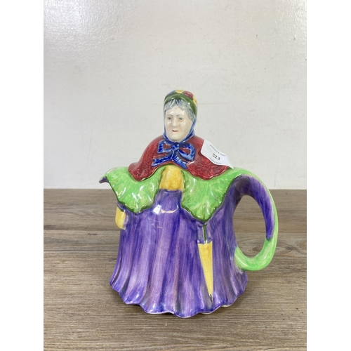 323 - A mid 20th century hand painted ceramic novelty lady three piece teaset - made in England