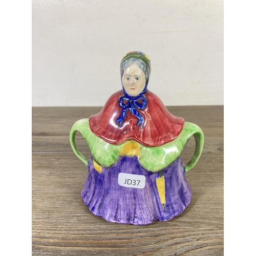 323 - A mid 20th century hand painted ceramic novelty lady three piece teaset - made in England