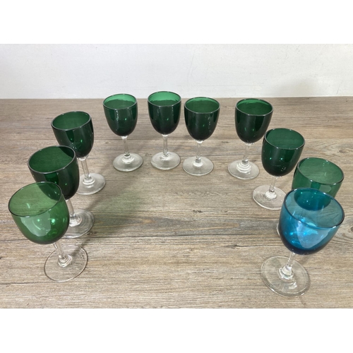 354C - A collection of clear and coloured glassware to include a Victorian penny lick ice cream glass etc.