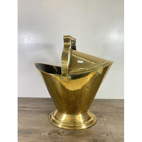 361 - A Victorian brass helmet coal scuttle - approx. 50cm high x 49cm wide x 28cm deep