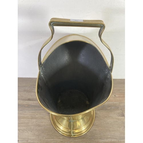 361 - A Victorian brass helmet coal scuttle - approx. 50cm high x 49cm wide x 28cm deep