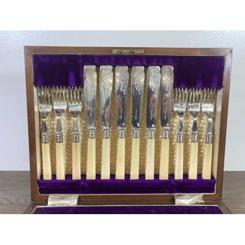 362 - A late 19th/early 20th century Walker & Hall twenty four piece fish knife and fork set in mahogany c... 