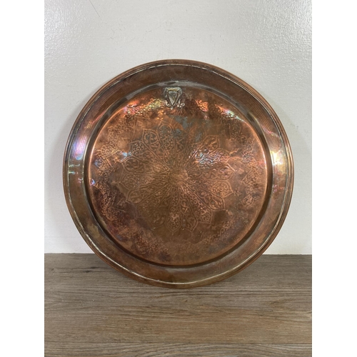 368 - Three pieces of Oriental metalware, brass vase, copper pie crust edge circular dish and copper charg... 