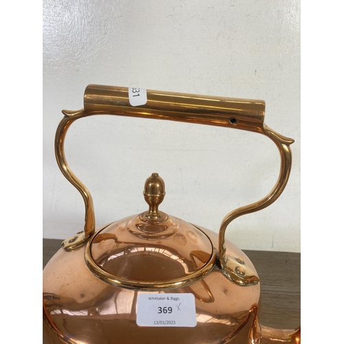 369 - A Victorian copper kettle with acorn finial - approx. 28cm high