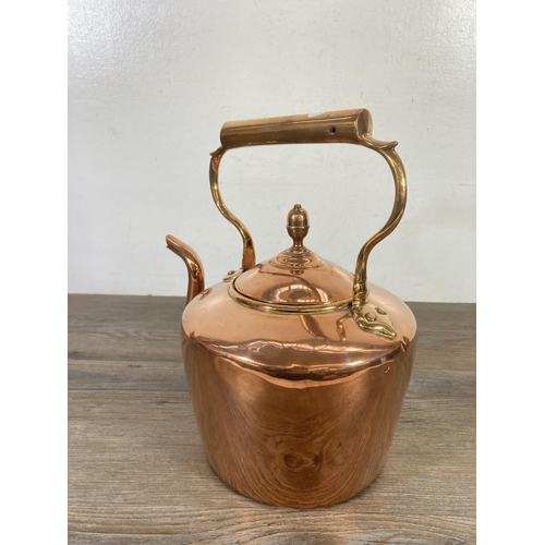 369 - A Victorian copper kettle with acorn finial - approx. 28cm high