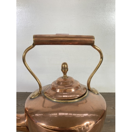 370 - A Victorian copper kettle with acorn finial - approx. 35cm high