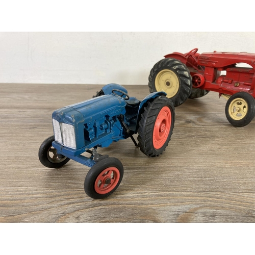 397 - Two mid 20th century model tractors, one Empire Made Fordson Major and one Lesney Massey Harris