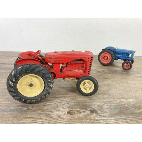 397 - Two mid 20th century model tractors, one Empire Made Fordson Major and one Lesney Massey Harris