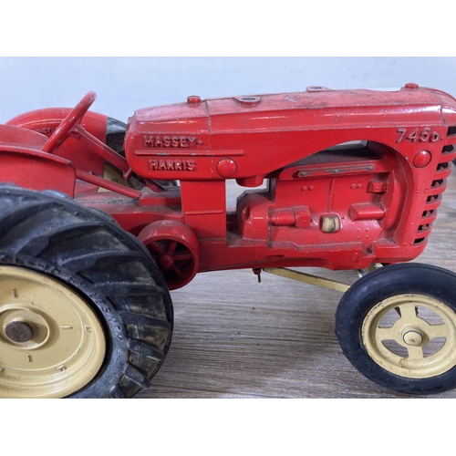 397 - Two mid 20th century model tractors, one Empire Made Fordson Major and one Lesney Massey Harris