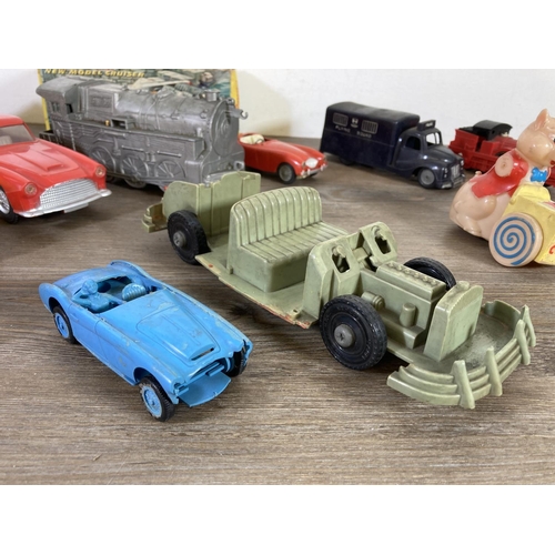 398 - A collection of mid 20th century toys to include no. 2040 Aston Martin made in Hong Kong, Casdon Pro... 