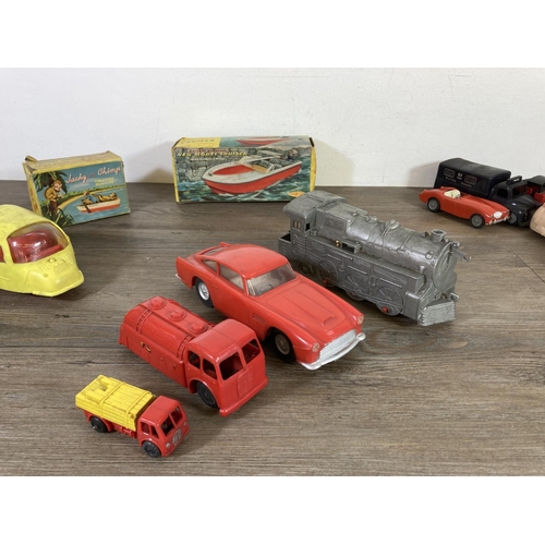 398 - A collection of mid 20th century toys to include no. 2040 Aston Martin made in Hong Kong, Casdon Pro... 