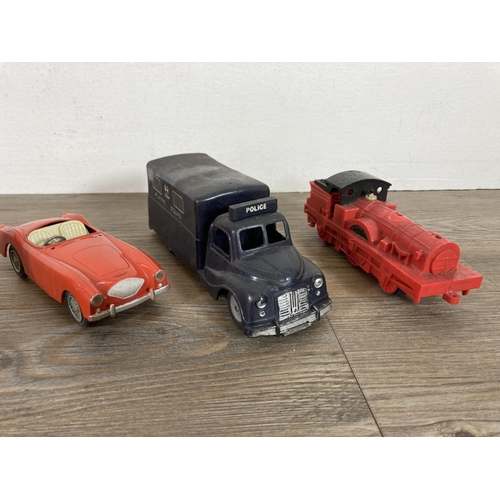 398 - A collection of mid 20th century toys to include no. 2040 Aston Martin made in Hong Kong, Casdon Pro... 