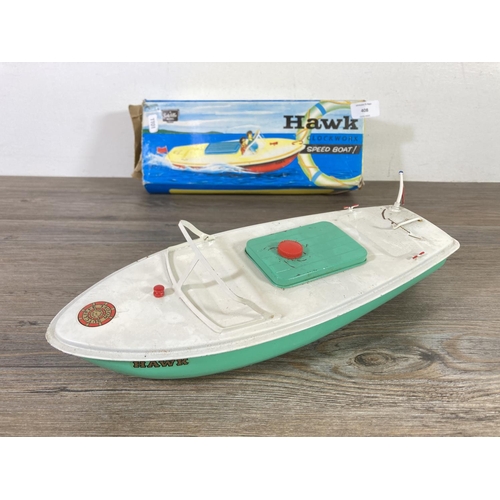 408 - A boxed Sutcliffe Hawk clockwork model speedboat