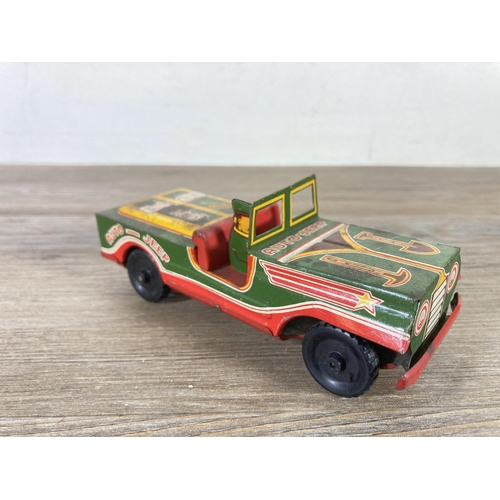 409 - Five mid 20th century tinplate model vehicles