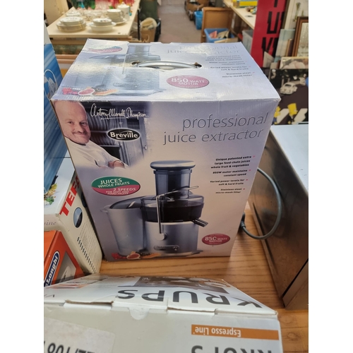 774 - Seven boxed items to include Breville Professional Juice extractor, Krups coffee machine, De'Longhi ... 