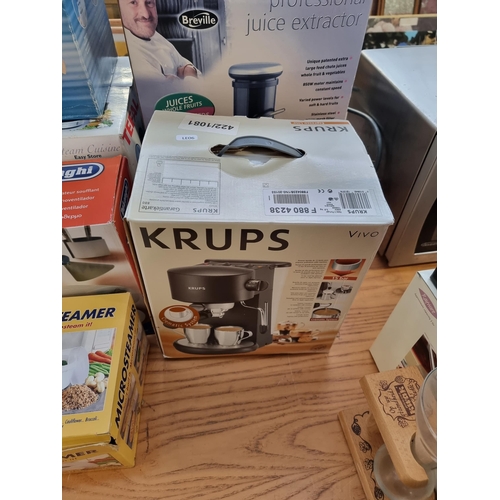 774 - Seven boxed items to include Breville Professional Juice extractor, Krups coffee machine, De'Longhi ... 