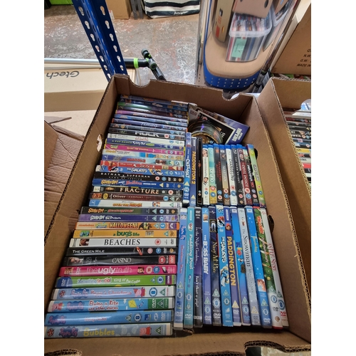 730 - Two boxes containing a collection of DVDs - see images for titles