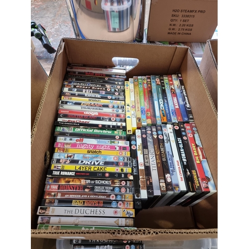 731 - Two boxes containing a collection of DVDs - see images for titles