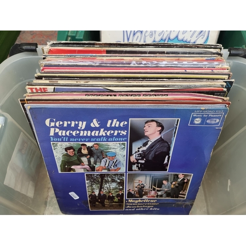 735 - Three boxes containing a collection of LP Vinyl records to include Merseybeats, Dave Berry (signed),... 