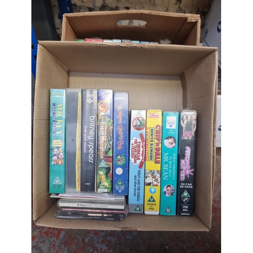 739 - Six boxes containing a large collection of VHS videos - see images for titles