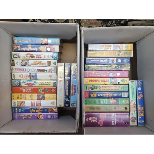 739 - Six boxes containing a large collection of VHS videos - see images for titles