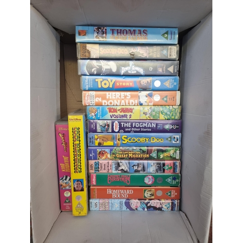 739 - Six boxes containing a large collection of VHS videos - see images for titles