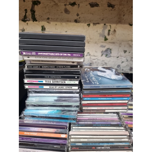 743 - A collection of CDs and compact cassettes - see images for titles