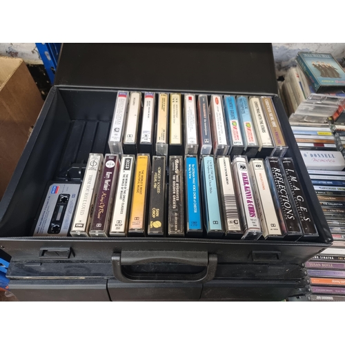 743 - A collection of CDs and compact cassettes - see images for titles