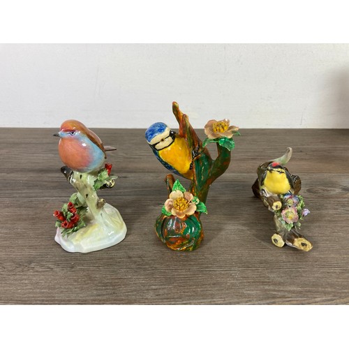 328 - Thirteen ceramic and resin bird figurines to include Royal Adderley, The Leonardo Collection Kingfis... 