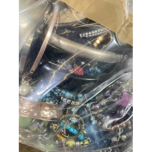 413 - Approx. 10kg of costume jewellery