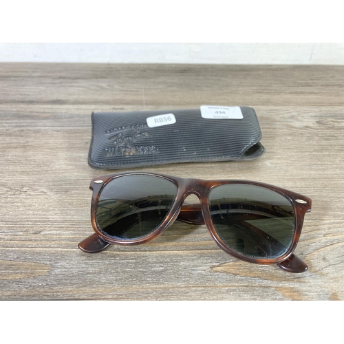 434 - A cased pair of Bausch & Lomb Ray-Ban Wayfarer tortoiseshell effect sunglasses