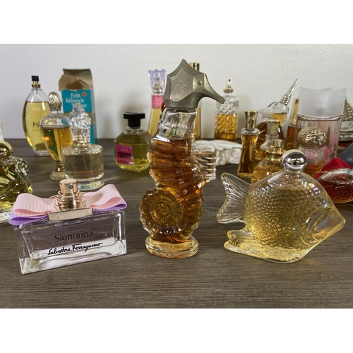 442 - A large collection of various part used fragrances