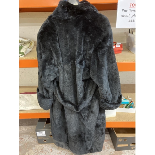 443 - A Jindo size 16 women's fur coat