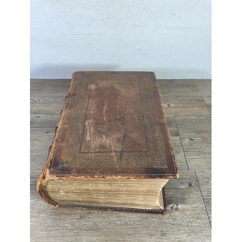 456 - An early 20th century leather hardback Family Bible