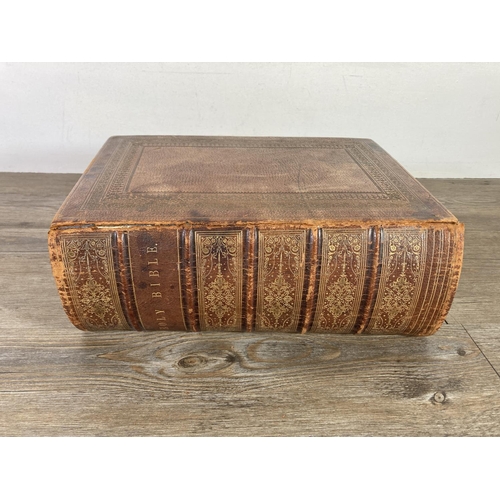 456 - An early 20th century leather hardback Family Bible