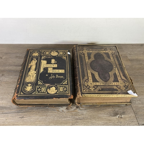 461 - Two late 19th/early 20th century hardback leather bound books, The Holy Bible and The Pilgrims Progr... 