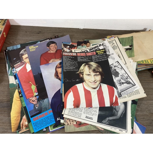 471 - A large collection of vintage football magazine cut outs