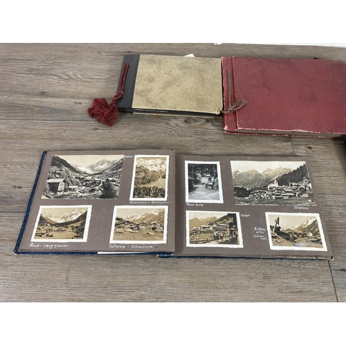 472 - A collection of early and mid 20th century photographs and postcards