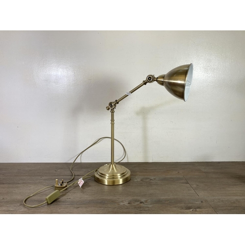 474 - An industrial style brass effect table lamp