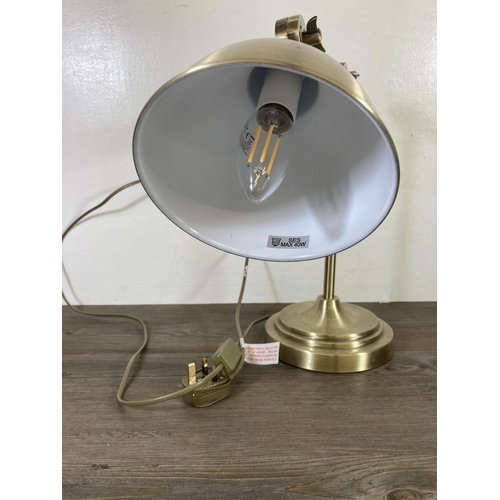 474 - An industrial style brass effect table lamp