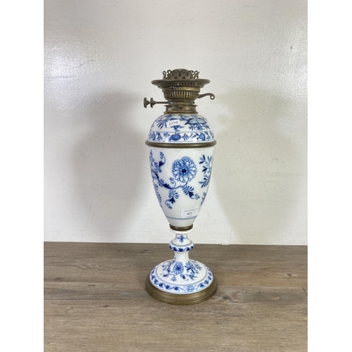 477 - A late 19th/early 20th century FS & Co Ltd Duplex brass and ceramic oil lamp